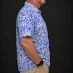Blue Splatter Performance Print Polo worn, side view