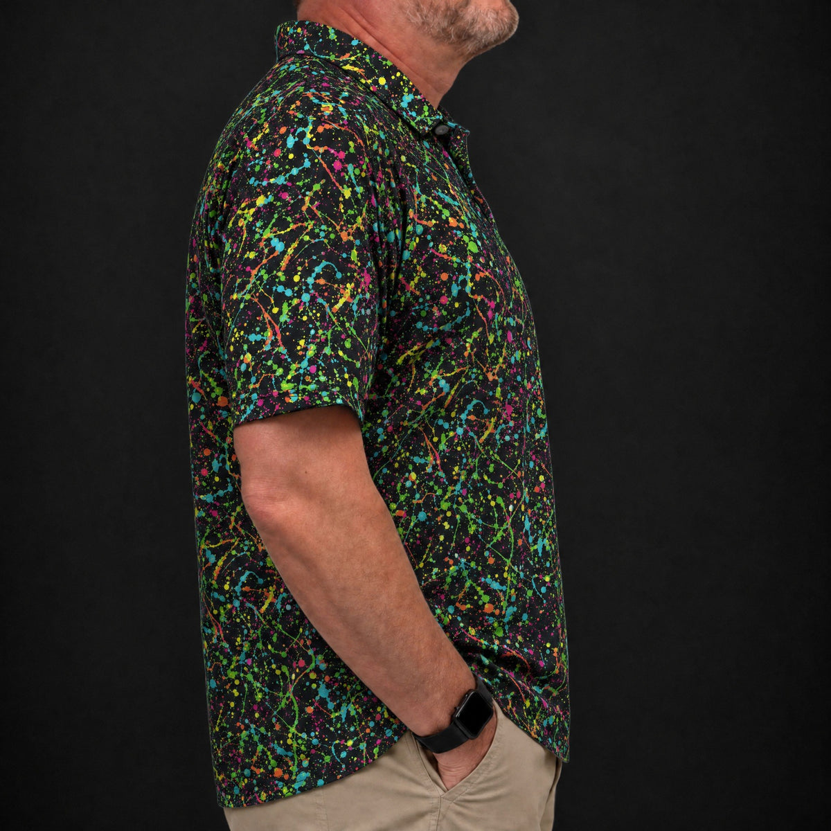 Electric Splatter Performance Print Polo worn, side view