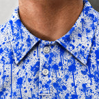 Blue Splatter Performance Print Polo, collar and placket close-up