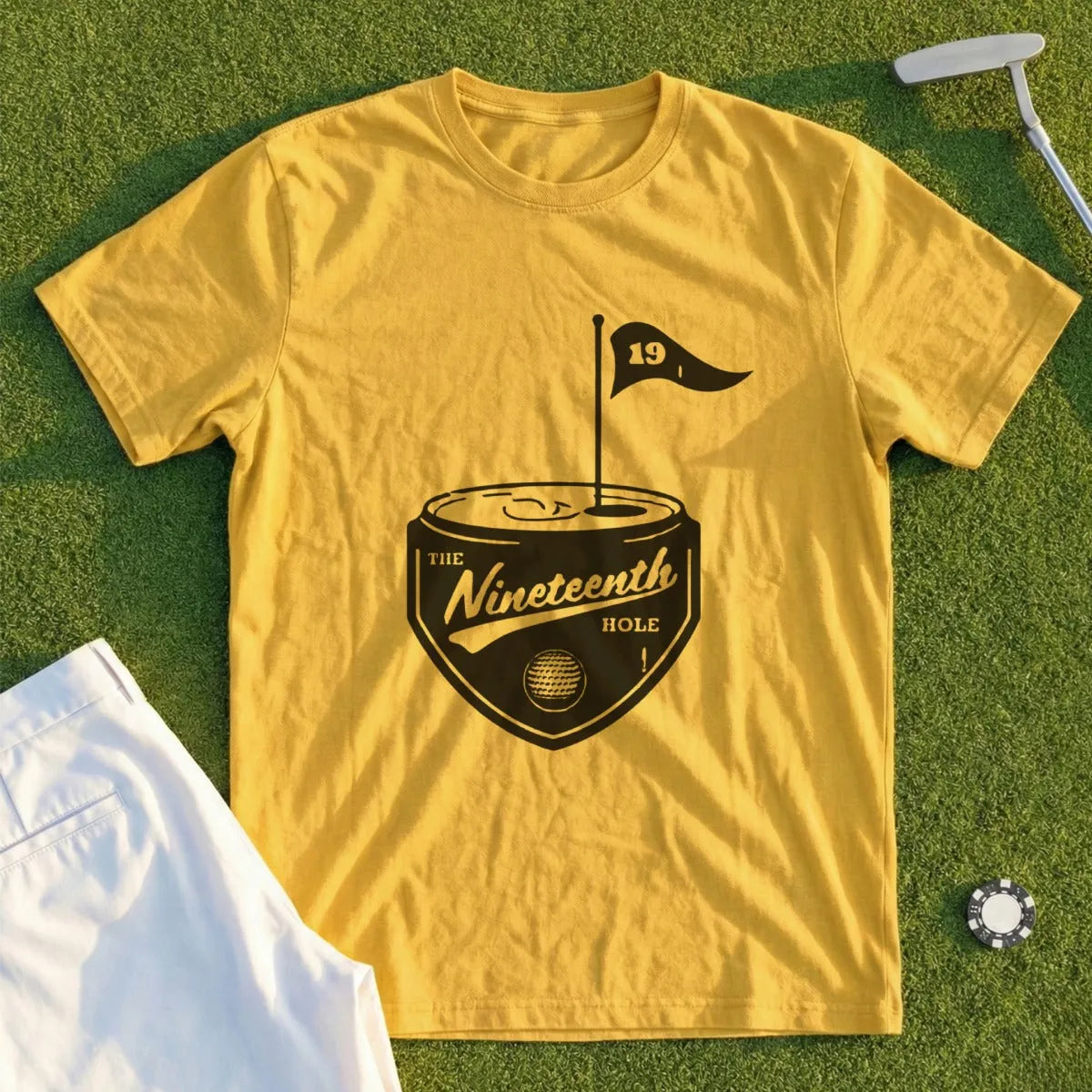 Yellow t-shirt with "The Nineteenth Hole" text and golf flag logo.