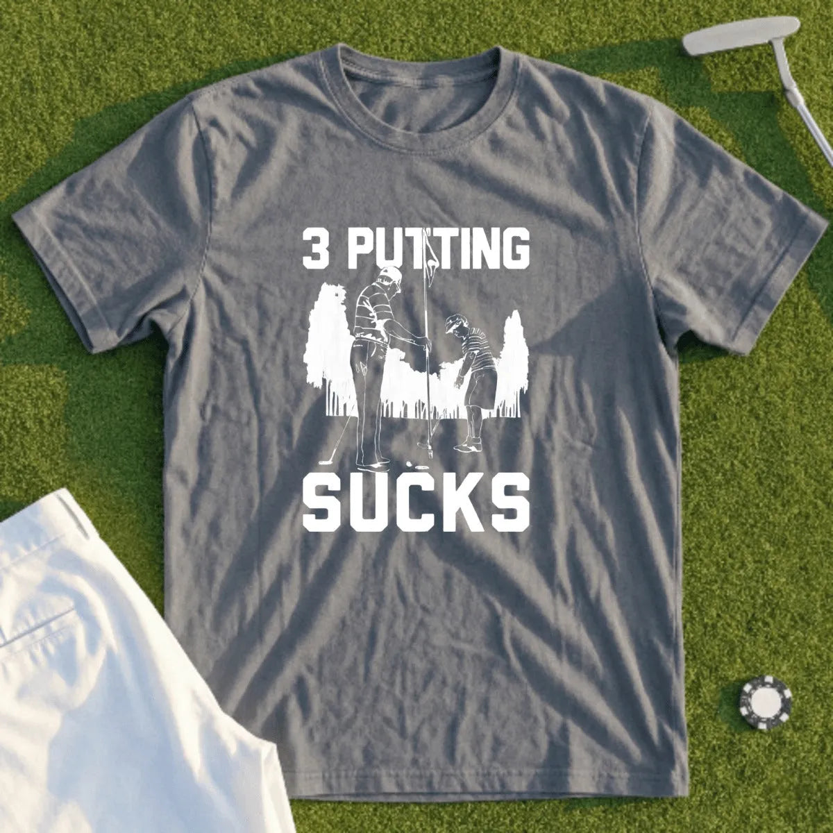 Gray t-shirt with "3 PUTTING SUCKS" text and golf graphic.