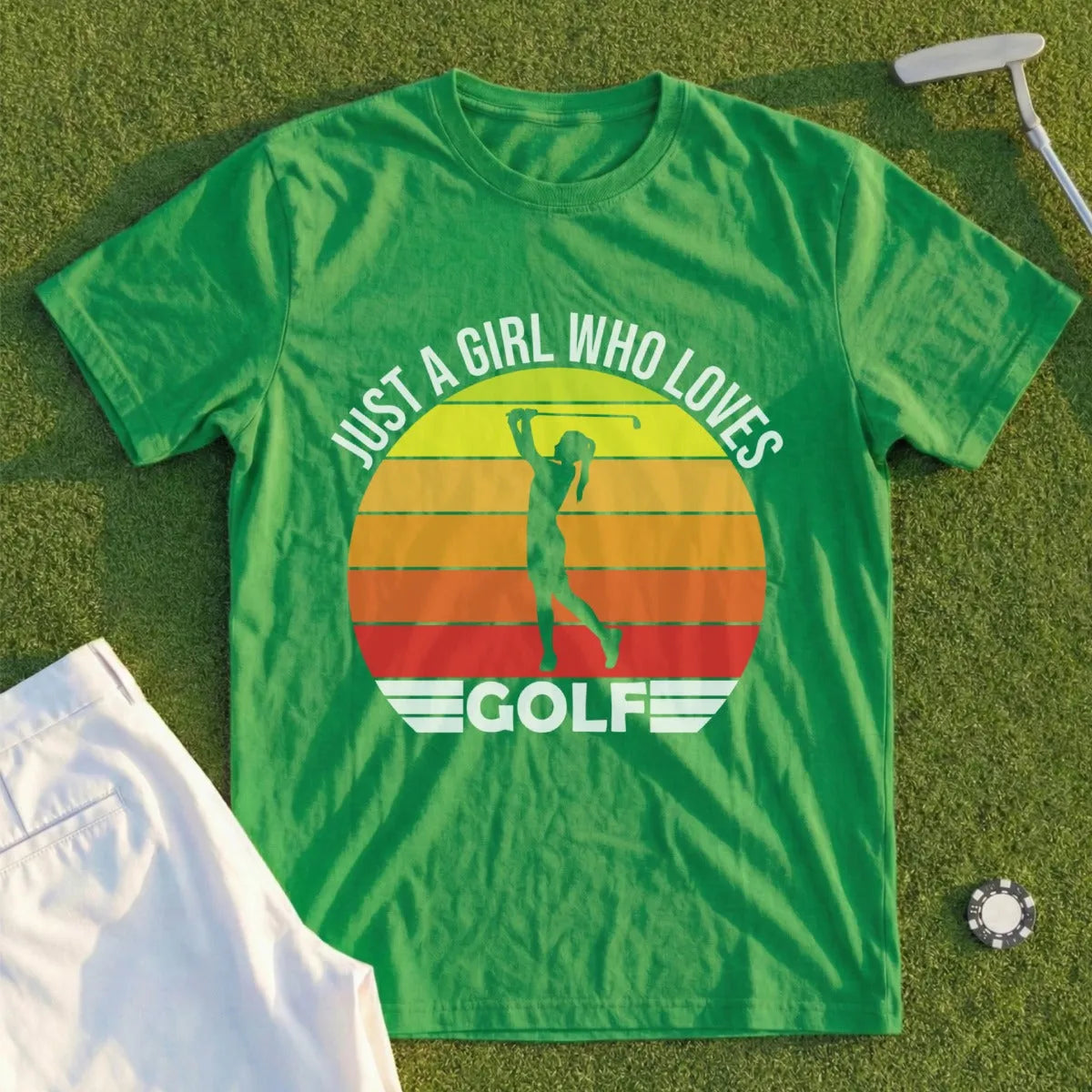 Green t-shirt with "JUST A GIRL WHO LOVES GOLF" text and a golfer silhouette.