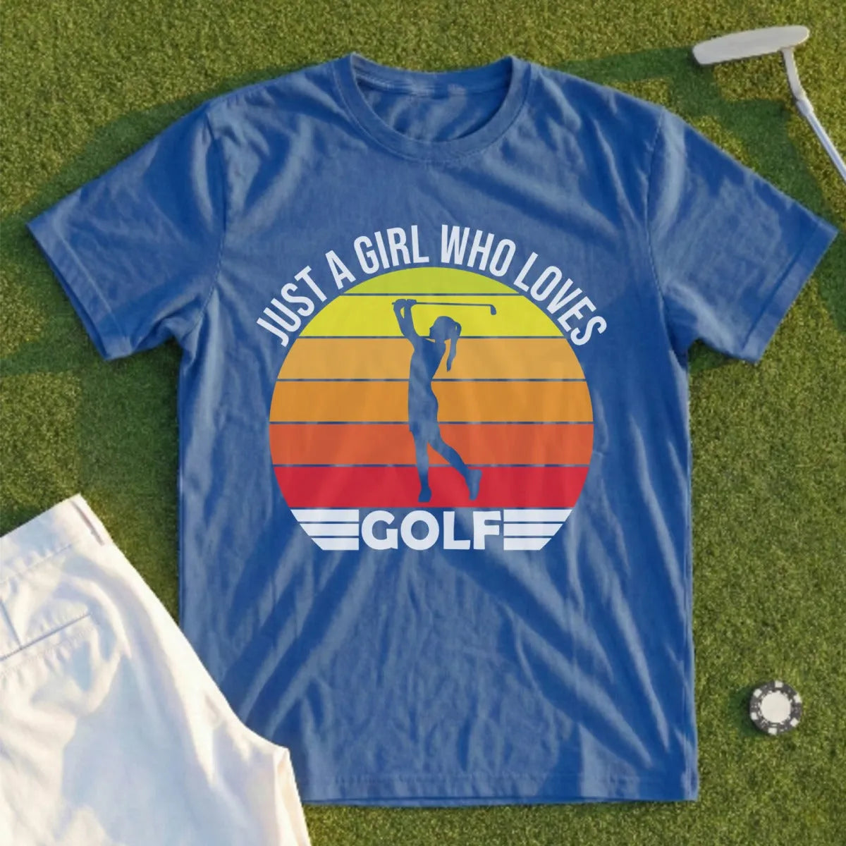 Blue t-shirt with "Just a girl who loves golf" text and a golfer graphic.