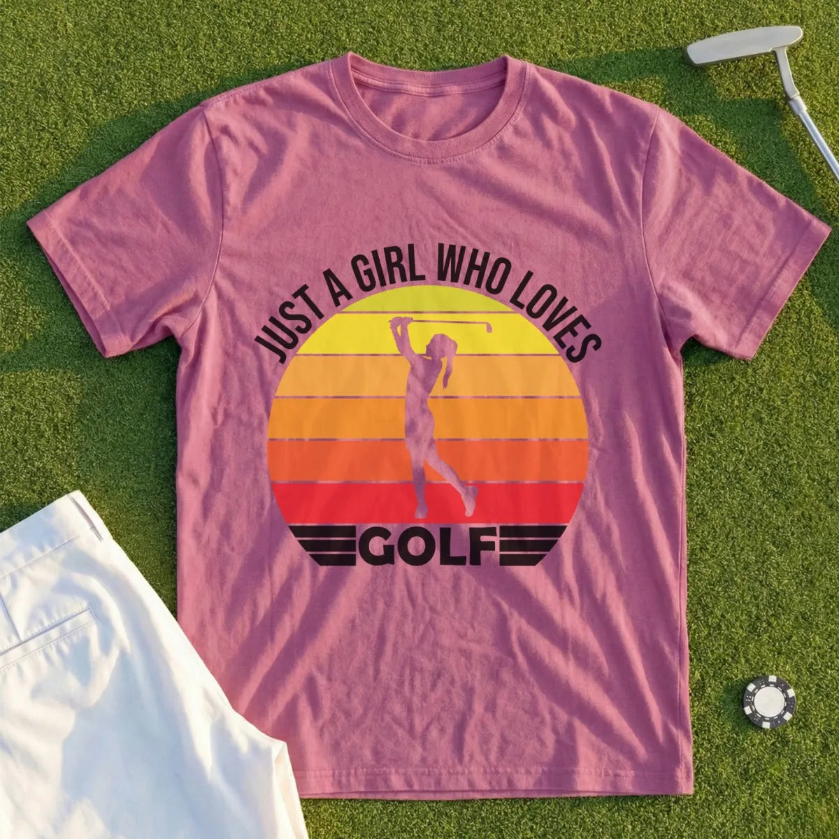 T-shirt with a sunset and a woman golfing.