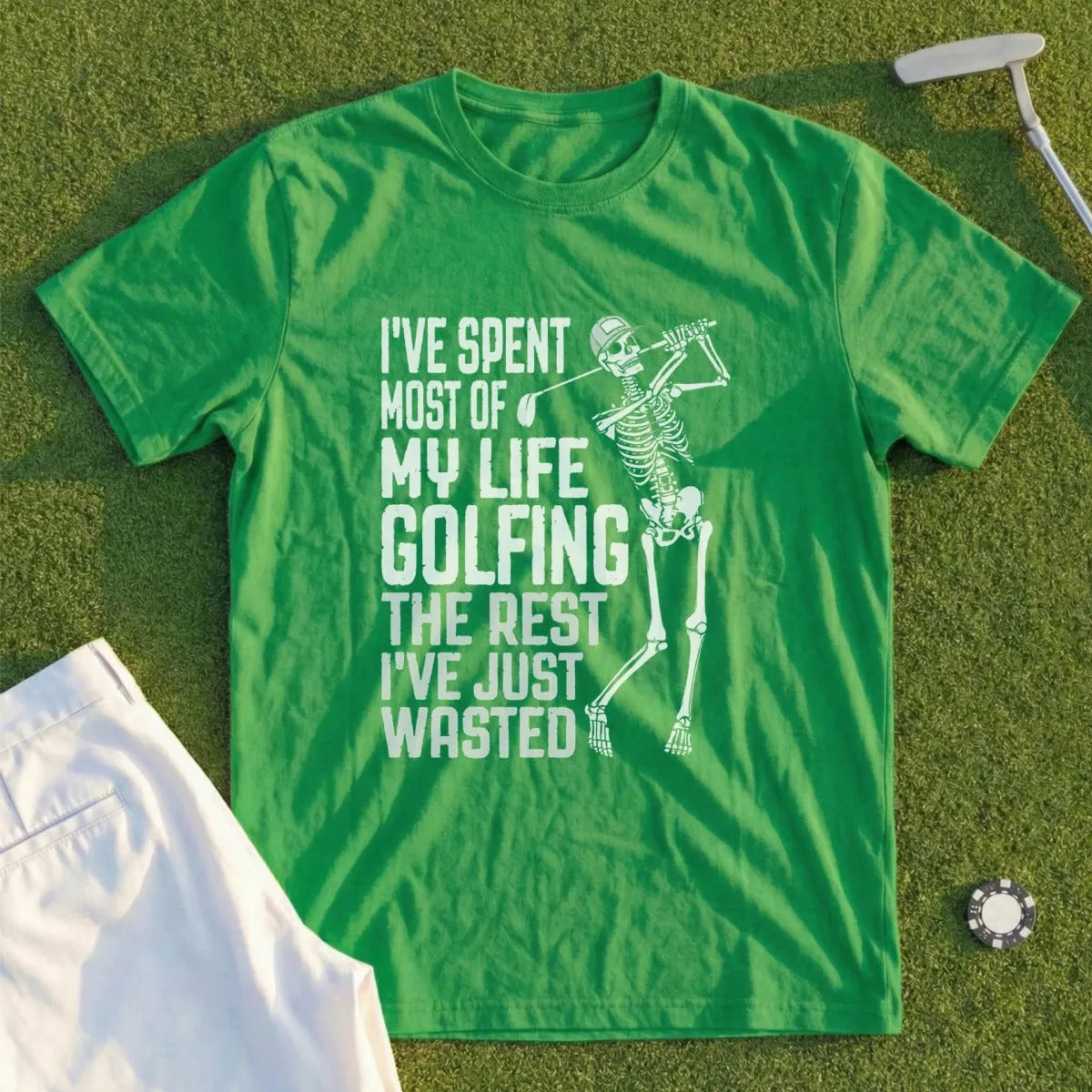 Green t-shirt with skeleton golfer graphic and text "I've spent most of my life golfing the rest I've just wasted."
