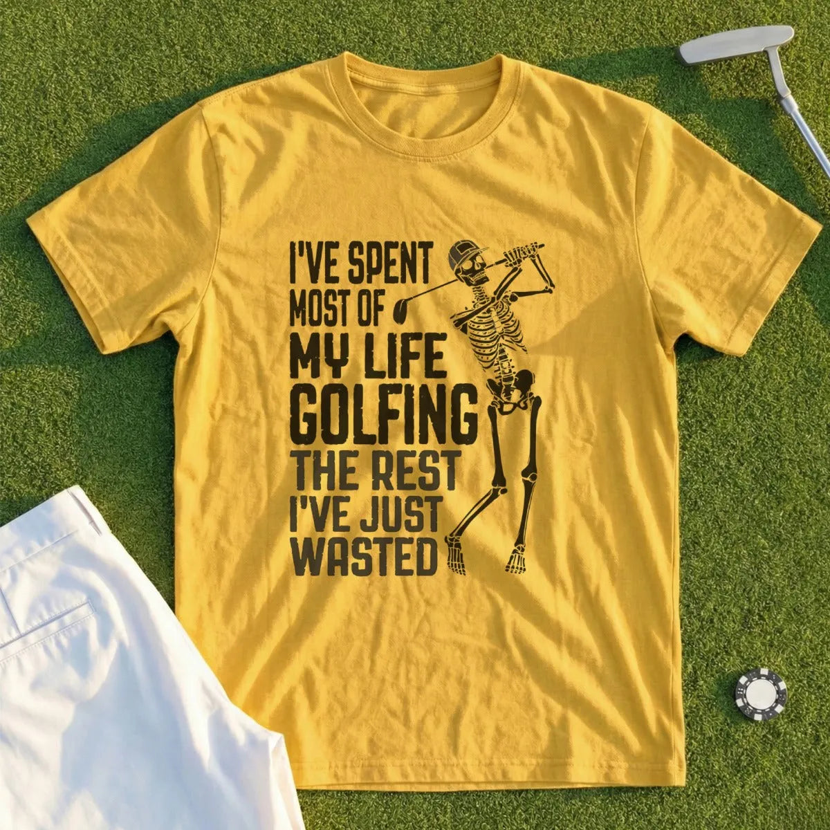 Yellow t-shirt with a skeleton golfer and text: "I've spent most of my life golfing the rest I've just wasted."