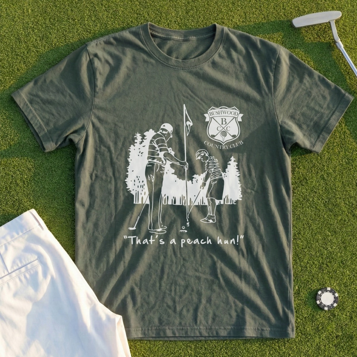 Green t-shirt with "Bushwood Country Club" logo and golfers.