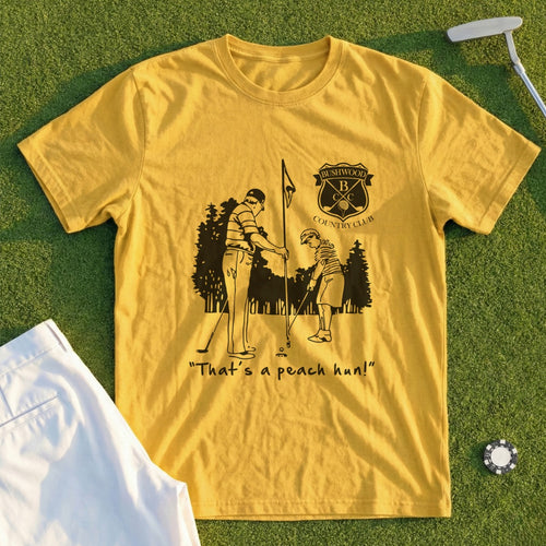 Yellow t-shirt with "That's a peach hum!" and golf illustration.