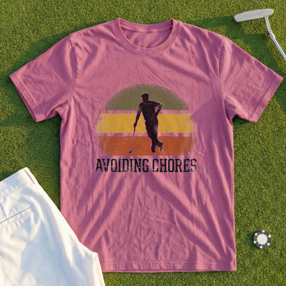 T-shirt with "AVOIDING CHORES" text and a golfer silhouette.