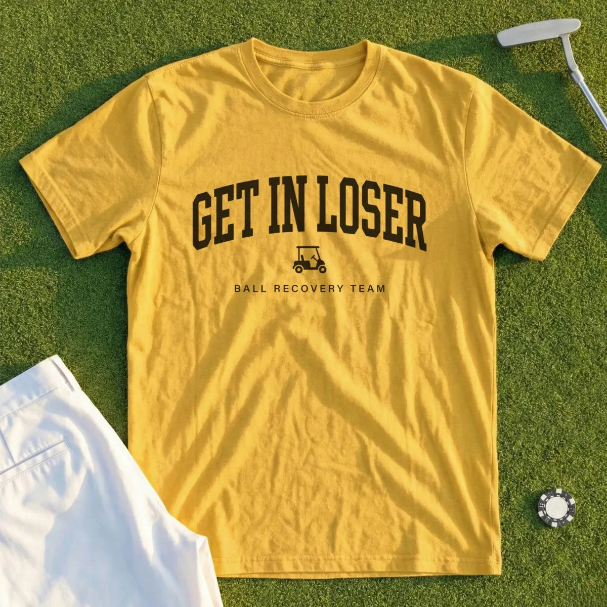 Yellow t-shirt with "GET IN LOSER" and golf cart graphic.