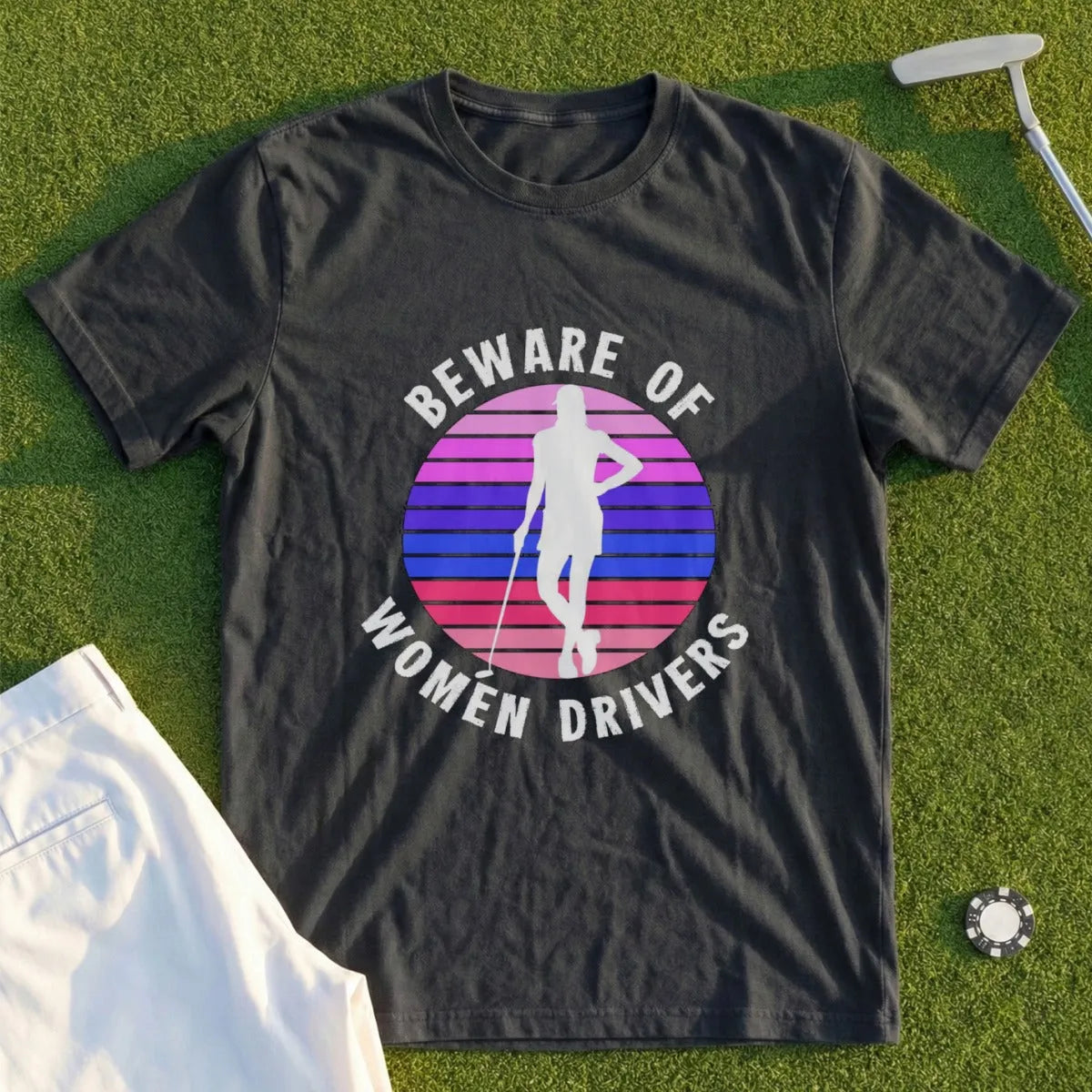 Dark t-shirt with circular graphic and text: "Beware of Women Drivers".