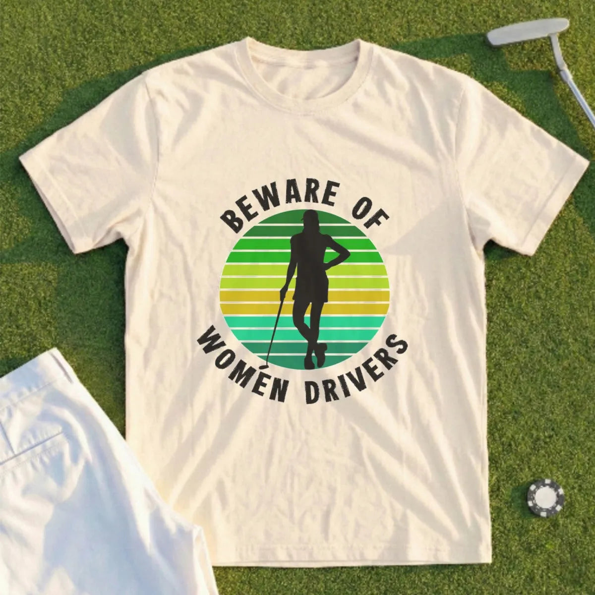 T-shirt with "Beware of Women Drivers" text and a female golfer silhouette.
