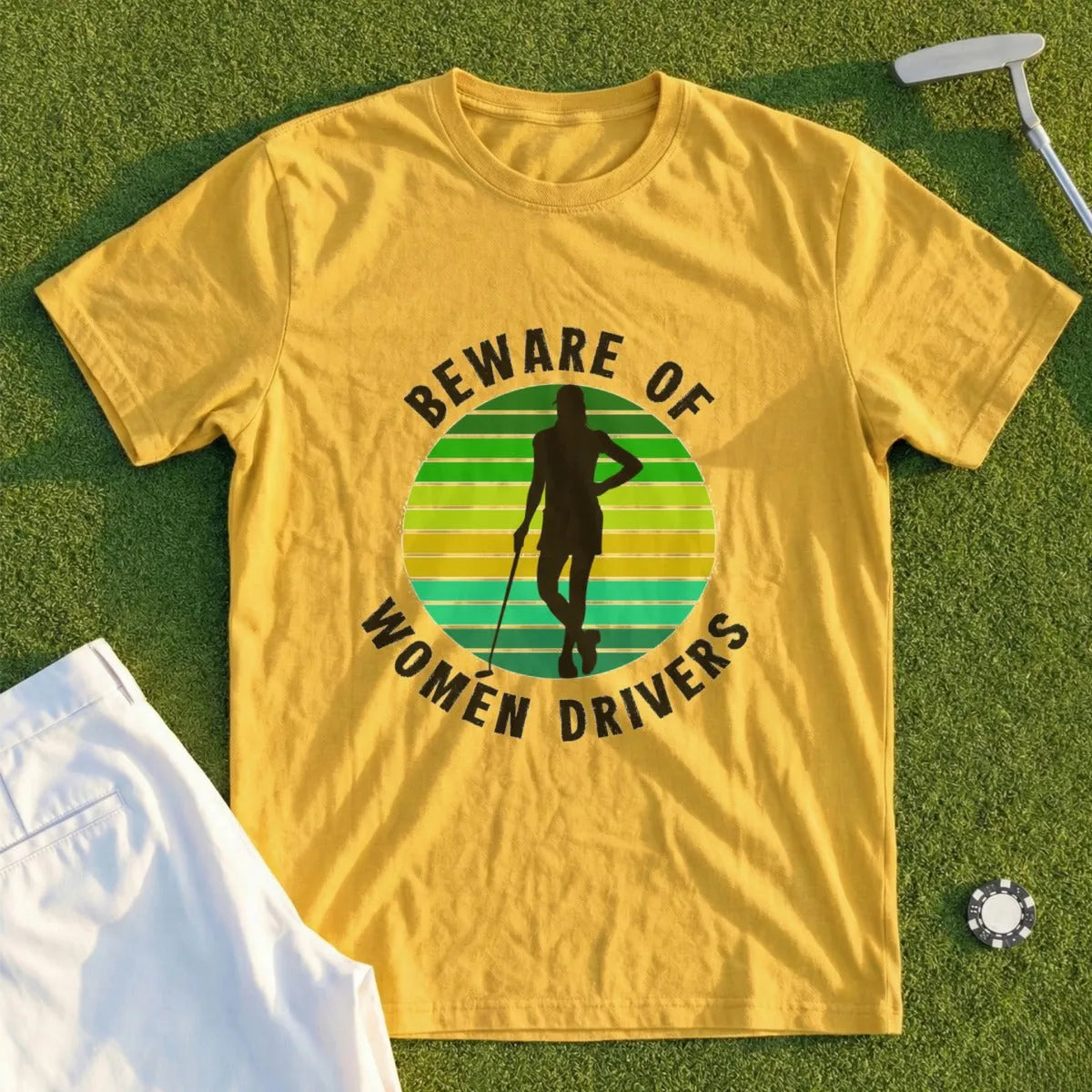 Yellow t-shirt with "Beware of Women Drivers" text and a female golfer graphic.