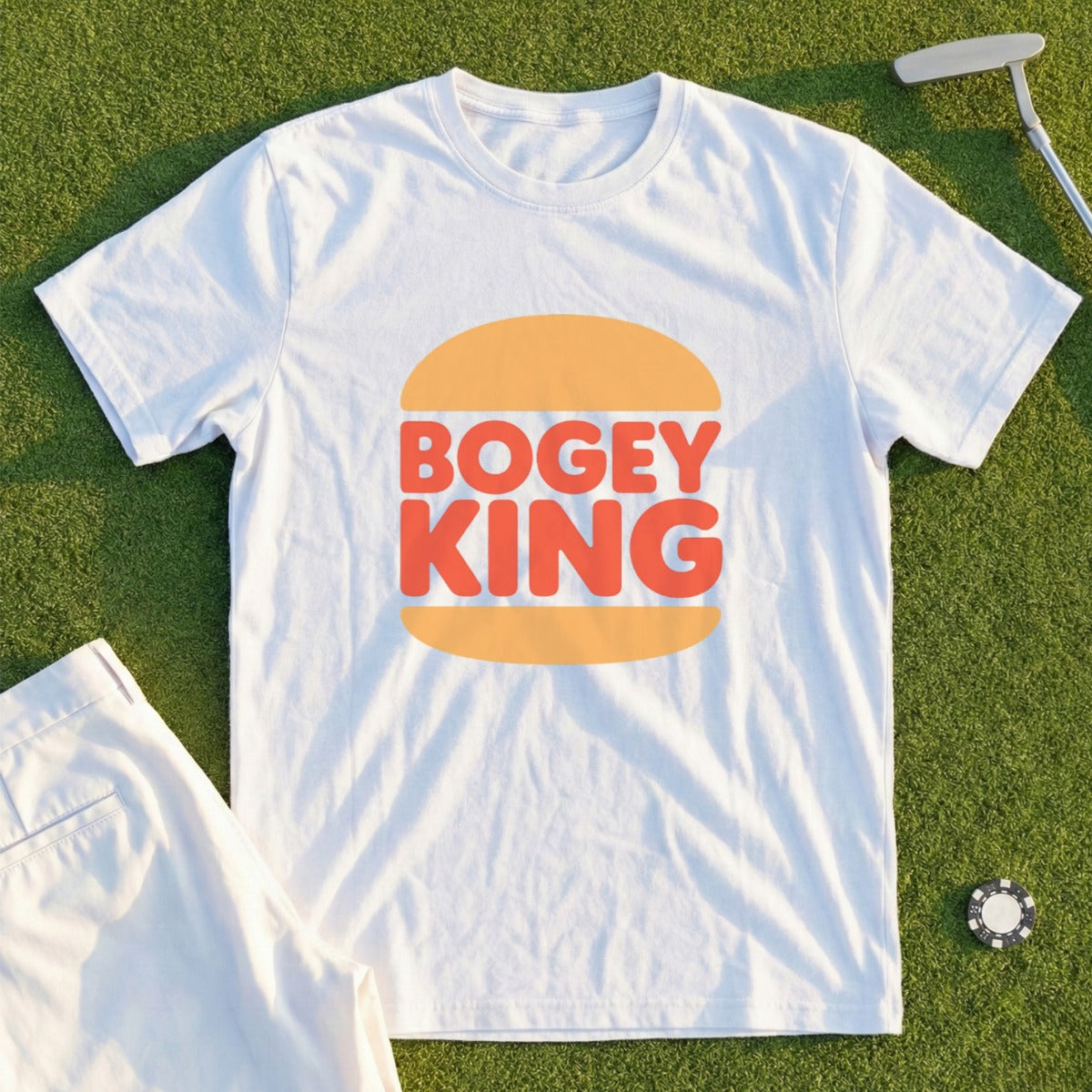 White t-shirt with "Bogey King" text in orange on a burger bun graphic.