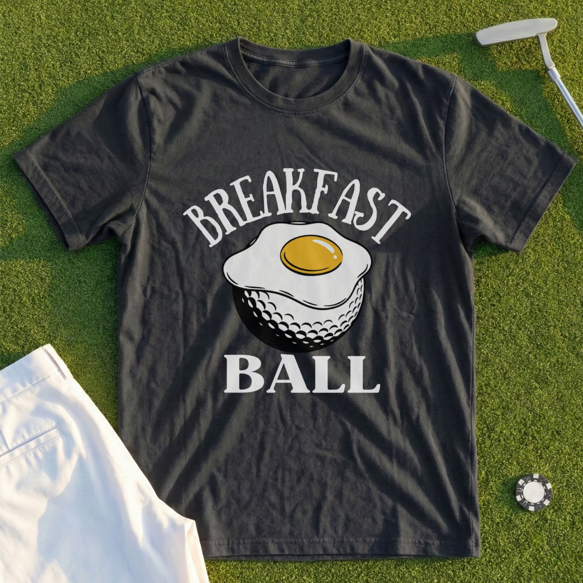 Dark t-shirt with "BREAKFAST BALL" and fried egg on a golf ball graphic.