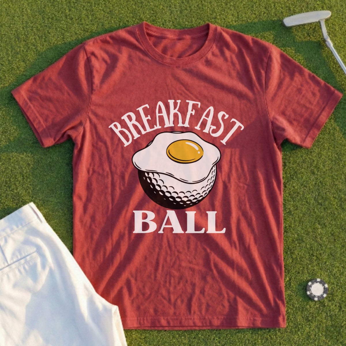 Red t-shirt with "BREAKFAST BALL" text over an egg on a golf ball.