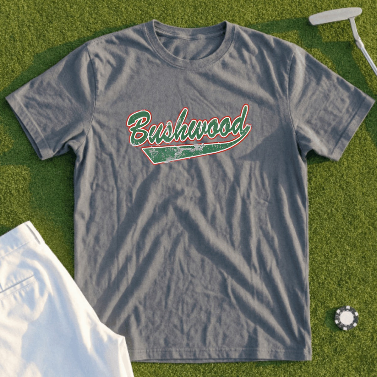 Gray t-shirt with "Bushwood" in green and red distressed lettering.