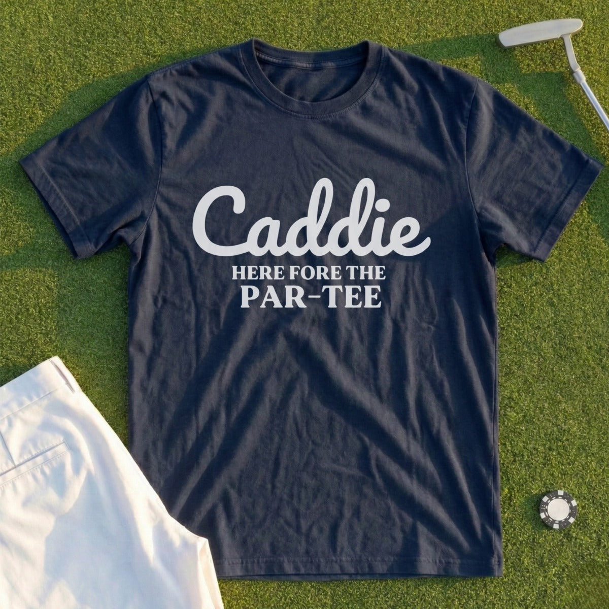 Navy t-shirt with "Caddie HERE FOR THE PAR-TEE" text, golf club, and tee.