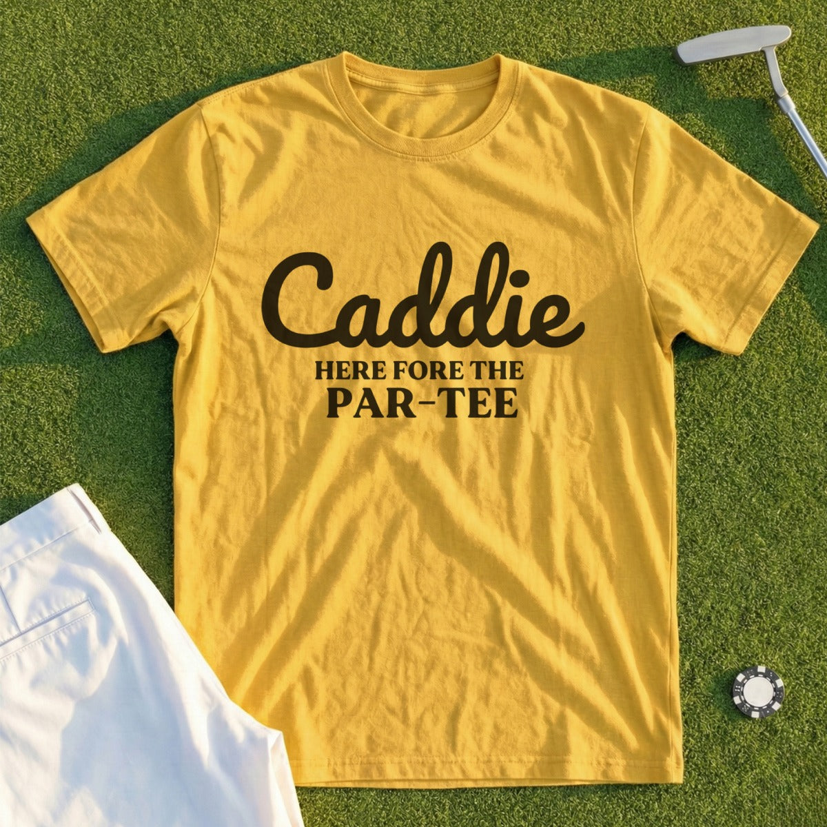 Yellow t-shirt with "Caddie HERE fore the PAR-TEE" text.