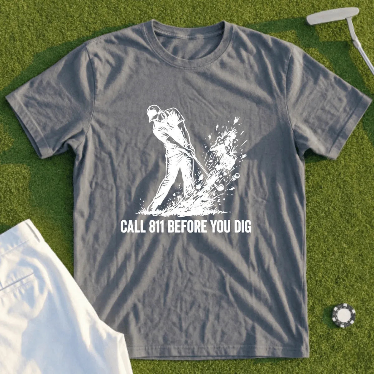 Gray t-shirt with a golfer swinging and "CALL 811 BEFORE YOU DIG" text.
