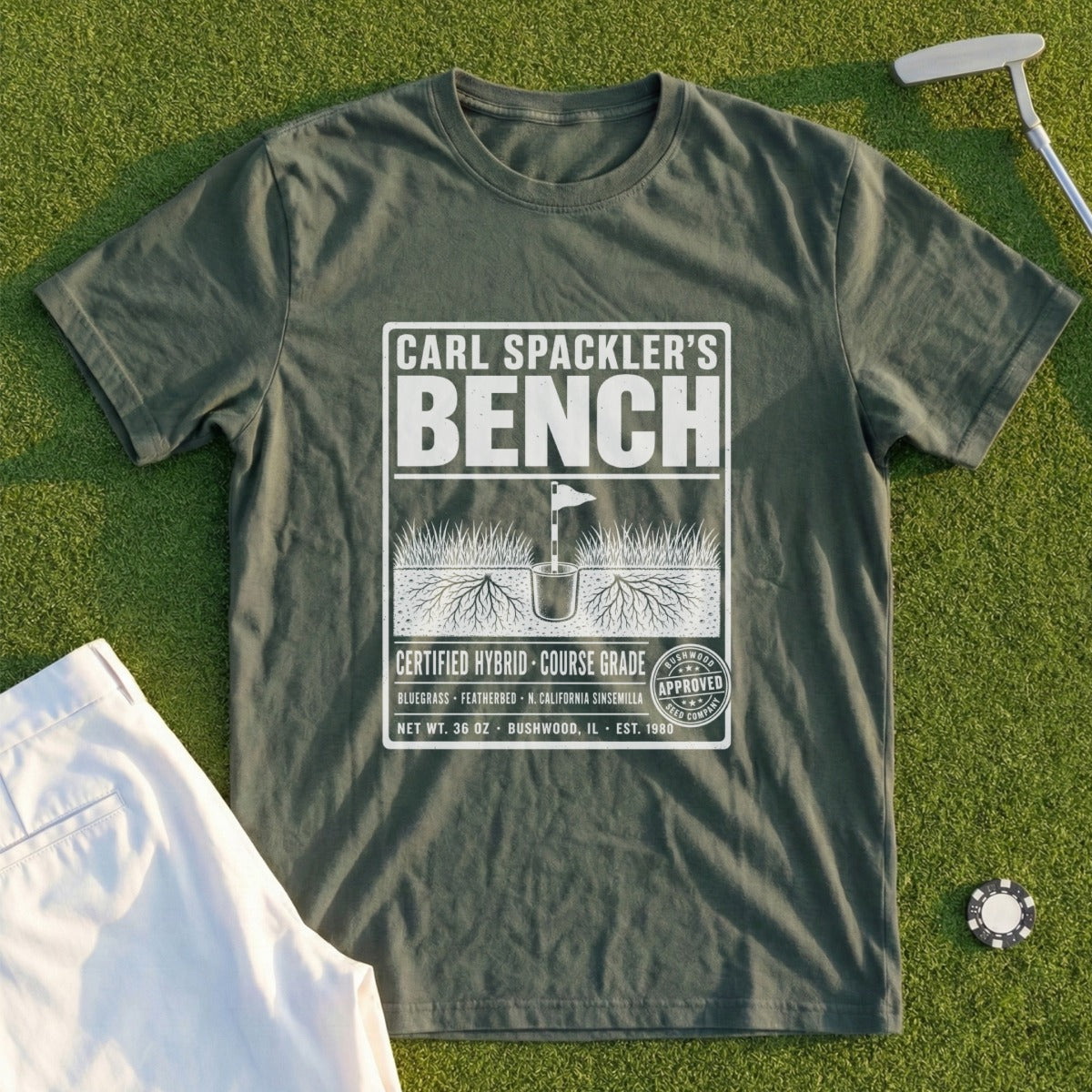 Green t-shirt with "Carl Spackler's Bench" logo and golf flag graphic.