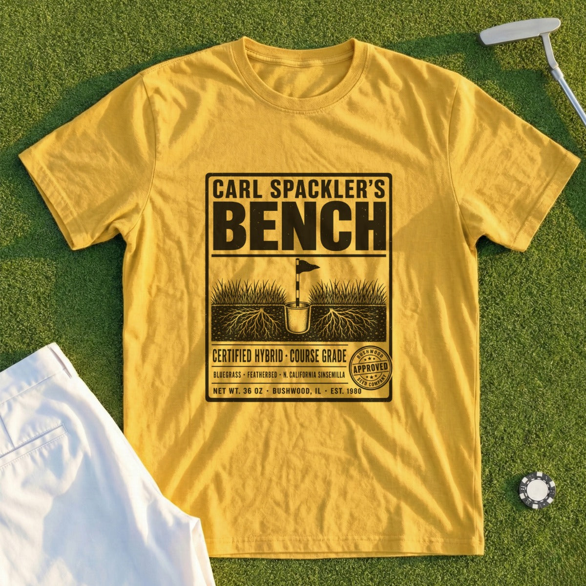 Yellow t-shirt with "Carl Spackler's Bench" logo and golf imagery.