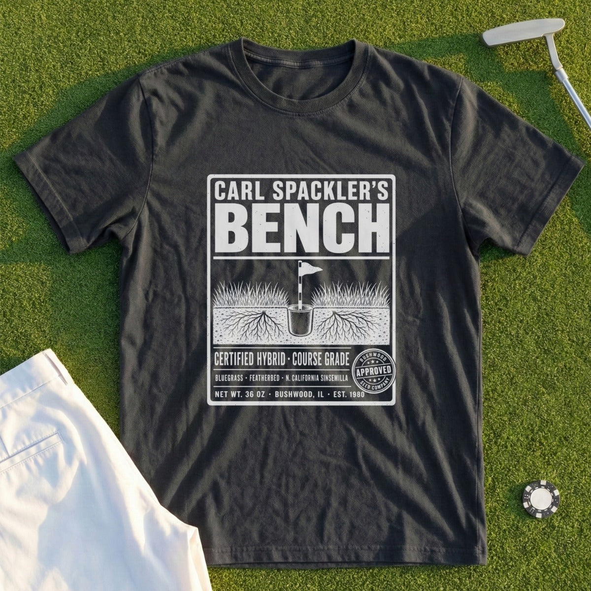 T-shirt with "Carl Spackler's Bench" and Bushwood Seed Company branding.