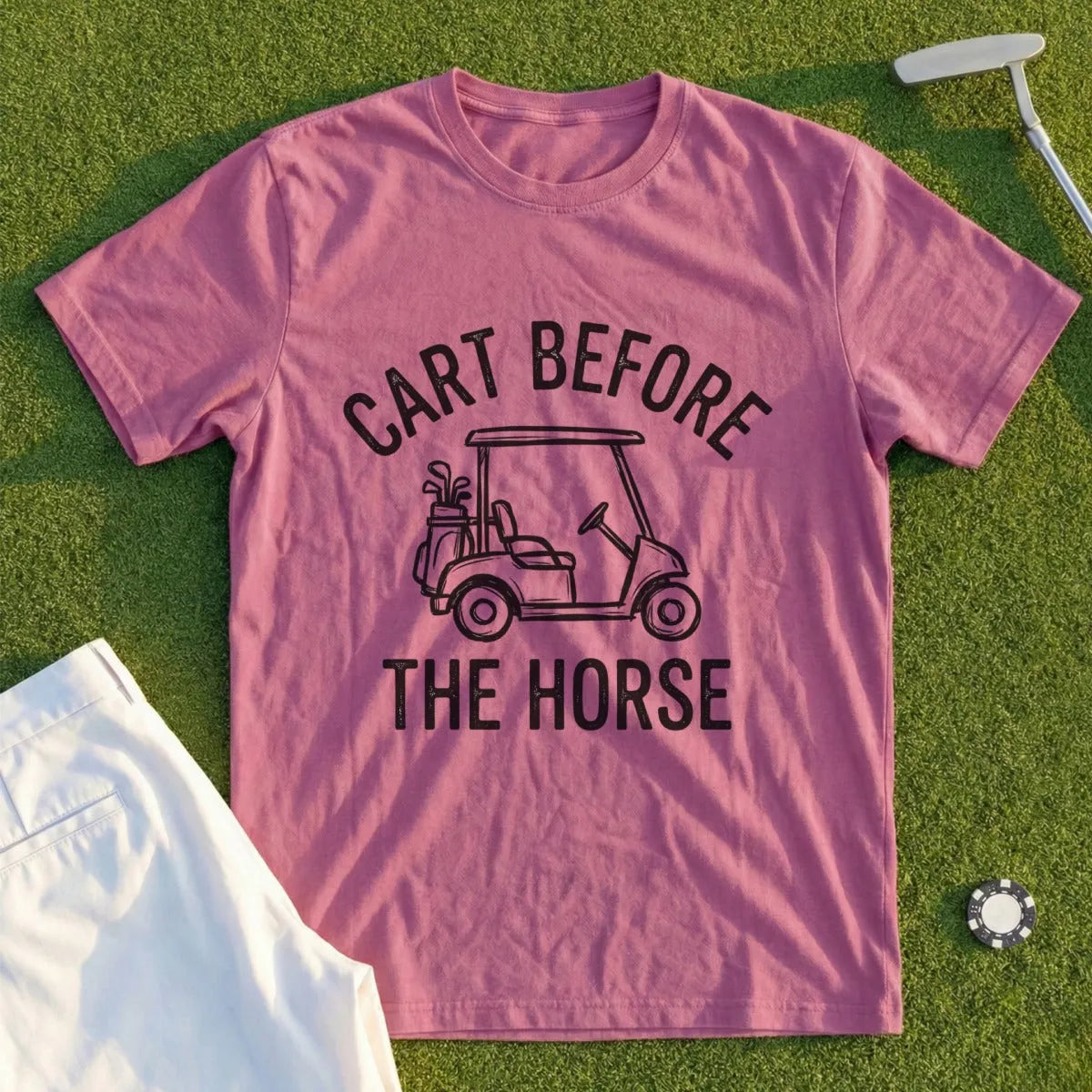 Pink t-shirt with "Cart Before The Horse" text and golf cart graphic.