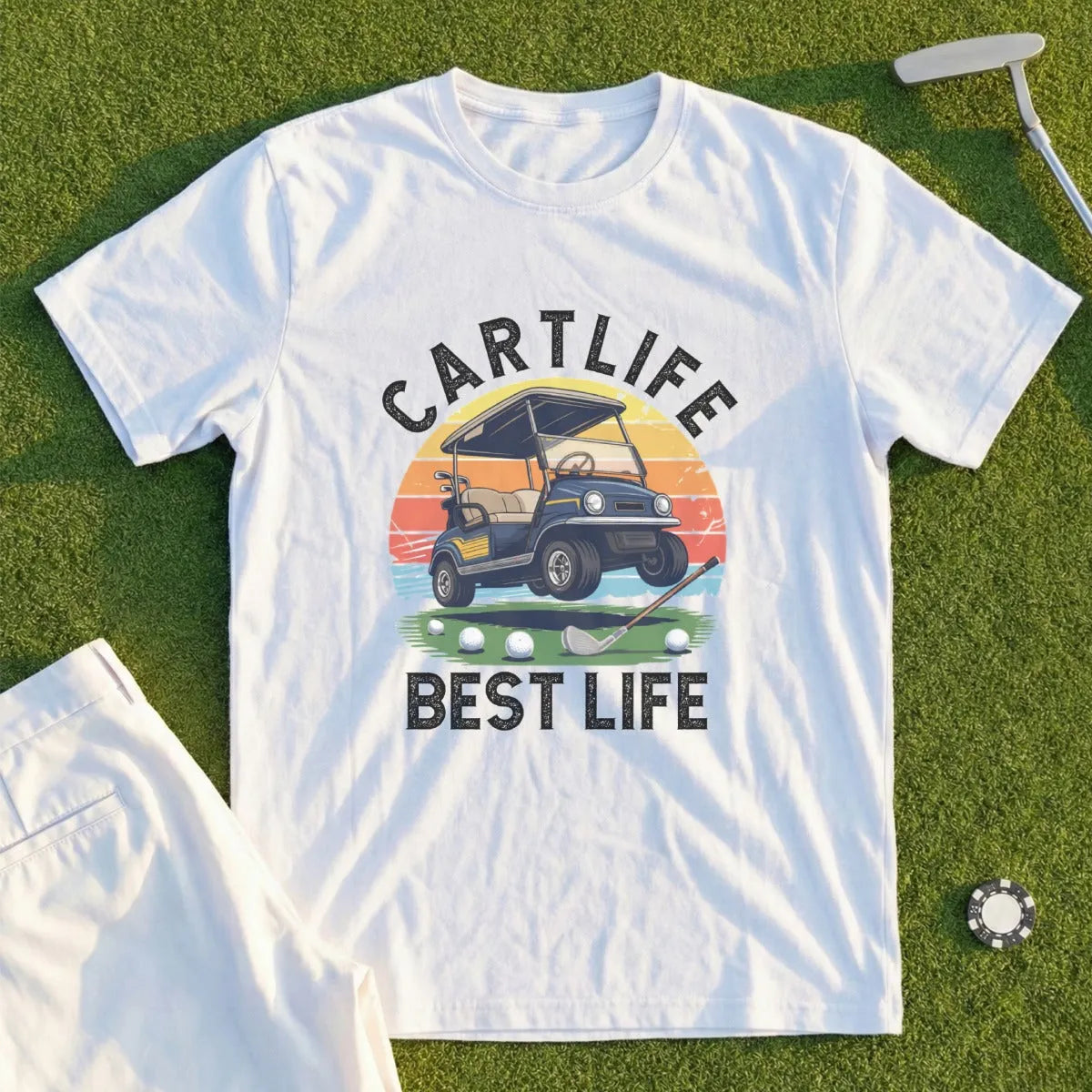 White t-shirt with "Cartlife Best Life" text, golf cart, and sunset graphic.