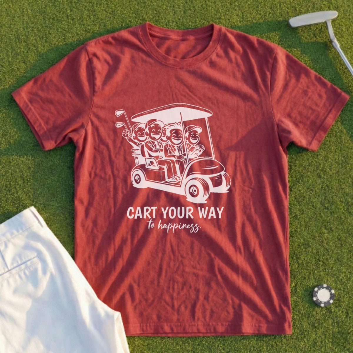 Maroon t-shirt with graphic of golfers in a cart and text "Cart Your Way to Happiness".