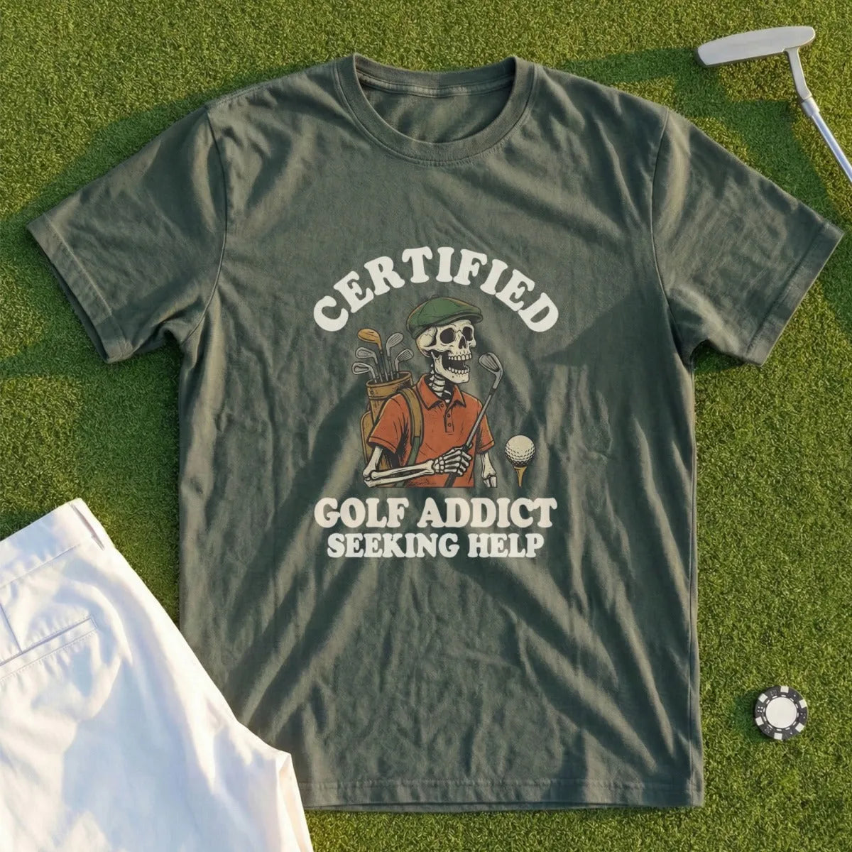 T-shirt with skeleton golfer graphic and text "CERTIFIED GOLF ADDICT SEEKING HELP".