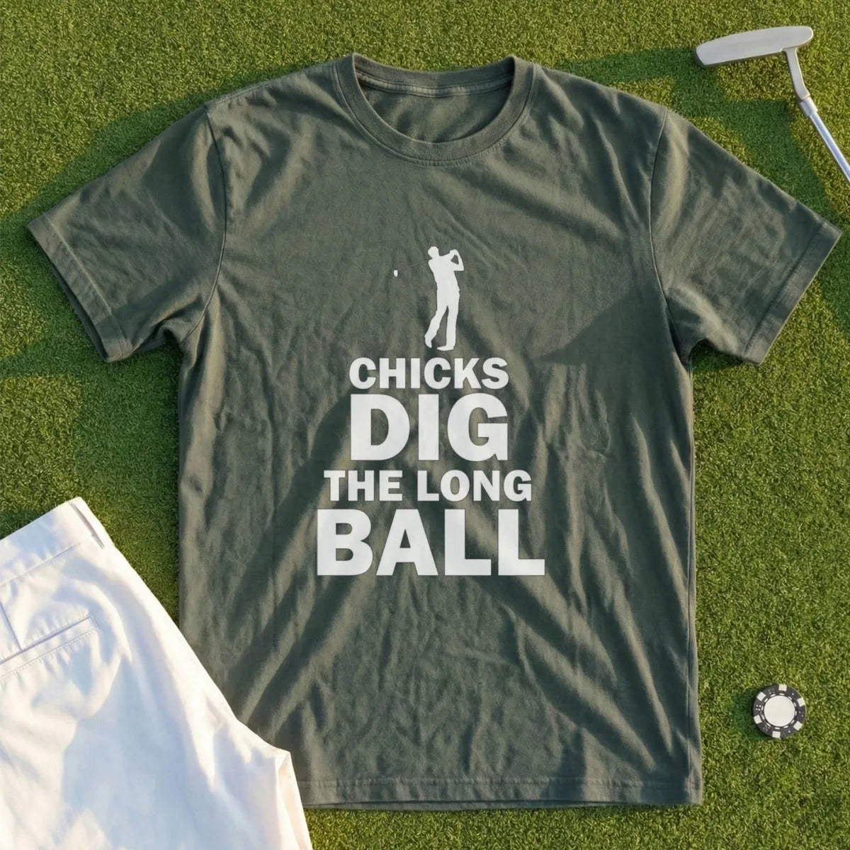 Olive green t-shirt with "CHICKS DIG THE LONG BALL" text and golfer graphic.