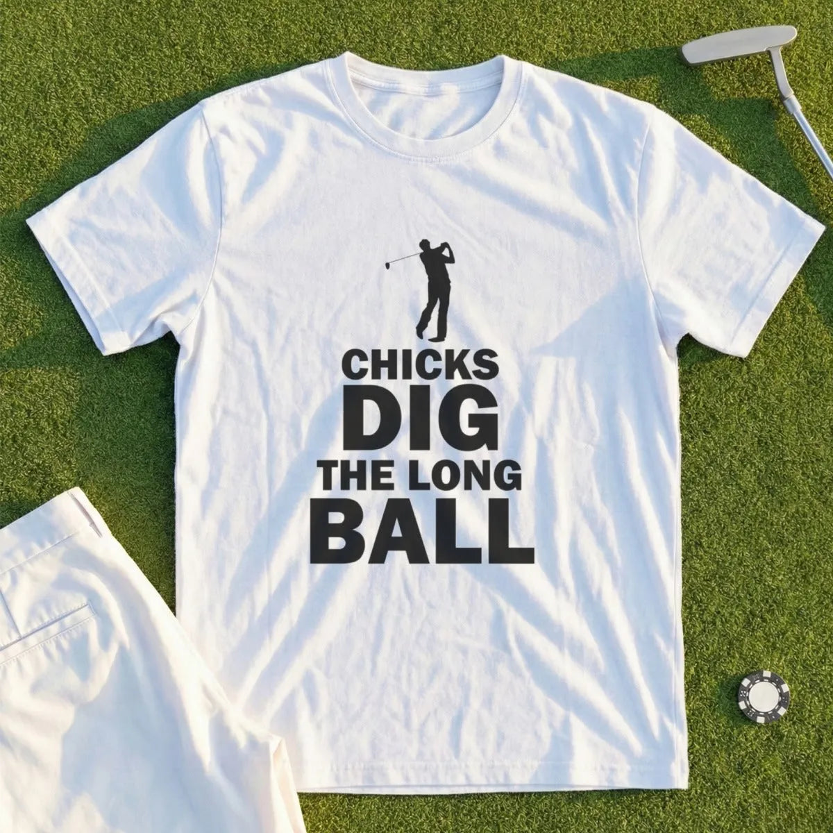 White t-shirt with "Chicks Dig The Long Ball" text and golf graphic.