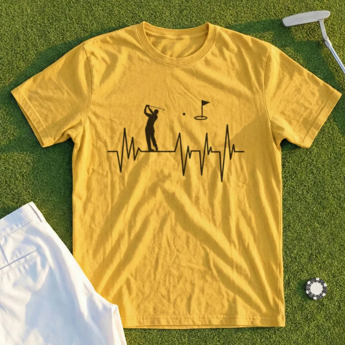 Yellow t-shirt with a golfer, golf flag, and heartbeat graphic.