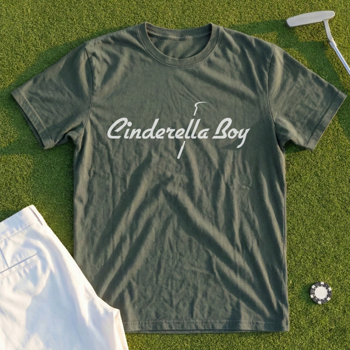 Green t-shirt with "Cinderella Boy" text and golf attire.
