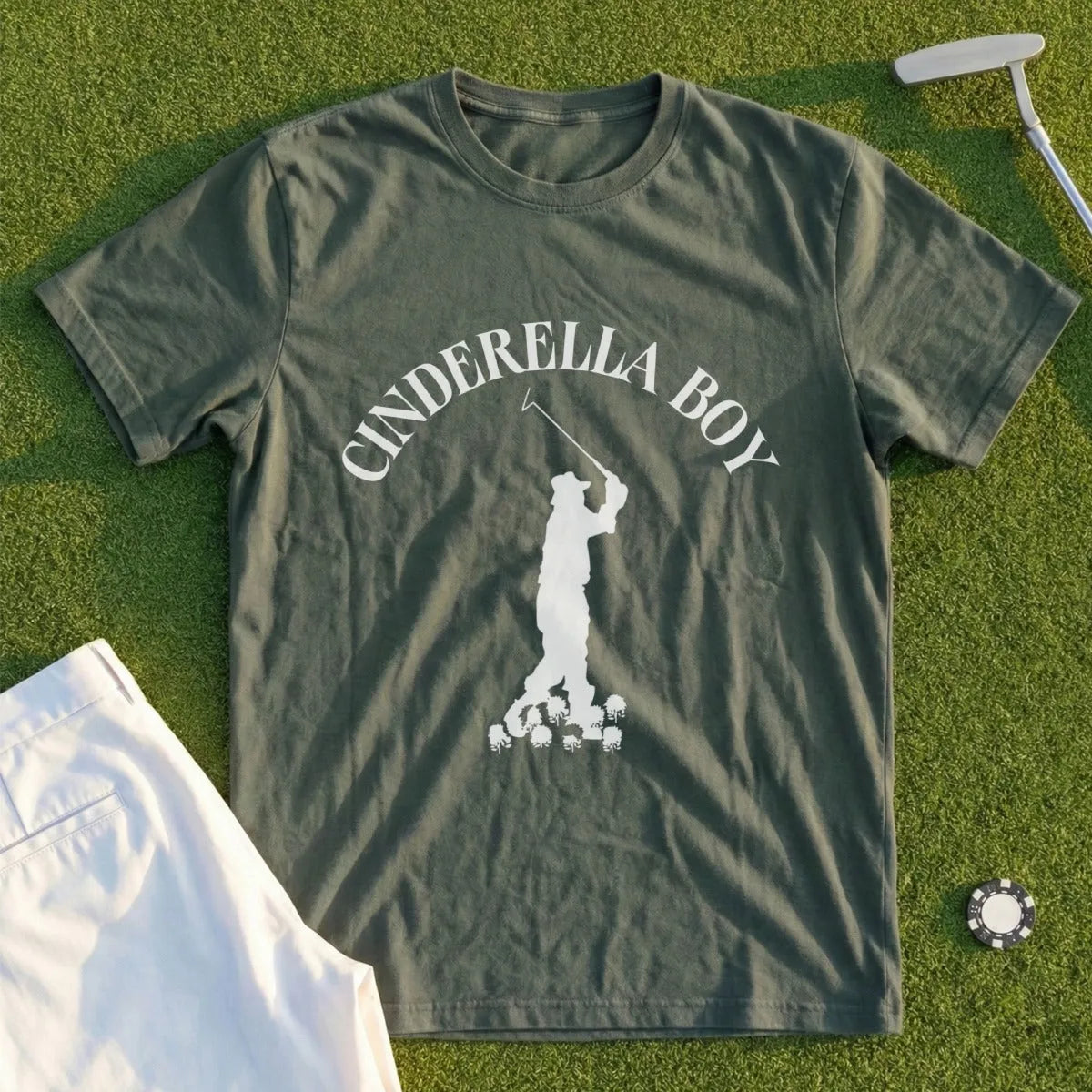 Green t-shirt with "CINDERELLA BOY" and golfer graphic.