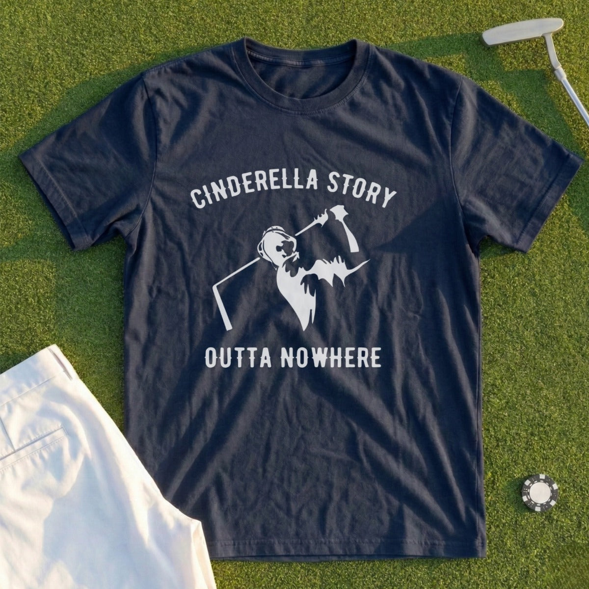 Navy t-shirt with "Cinderella Story Outta Nowhere" graphic and golfer.