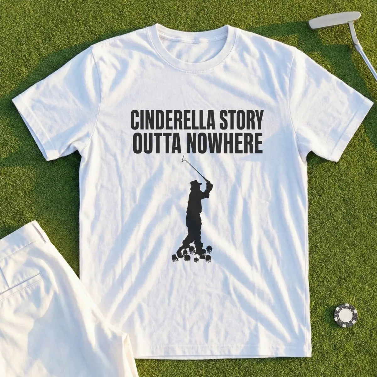 White t-shirt with "Cinderella Story Outta Nowhere" and golf silhouette graphic.