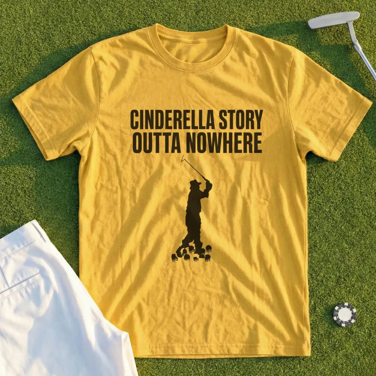 Yellow t-shirt with "CINDERELLA STORY OUTTA NOWHERE" text and a golfer silhouette.