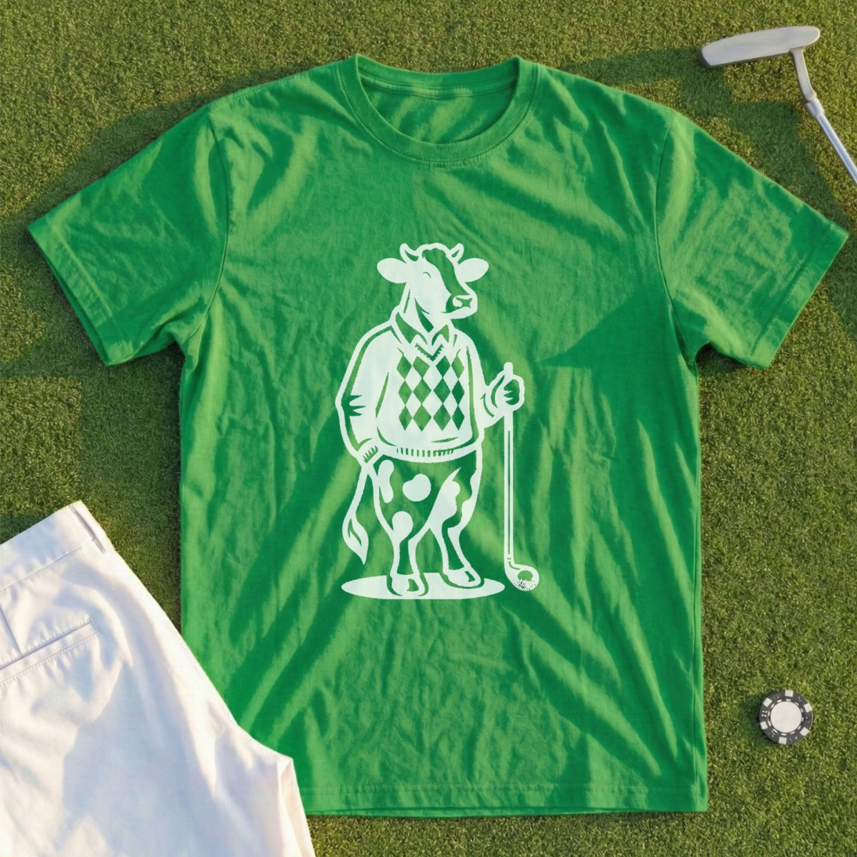 Green t-shirt with a white graphic of a cow holding a golf club.