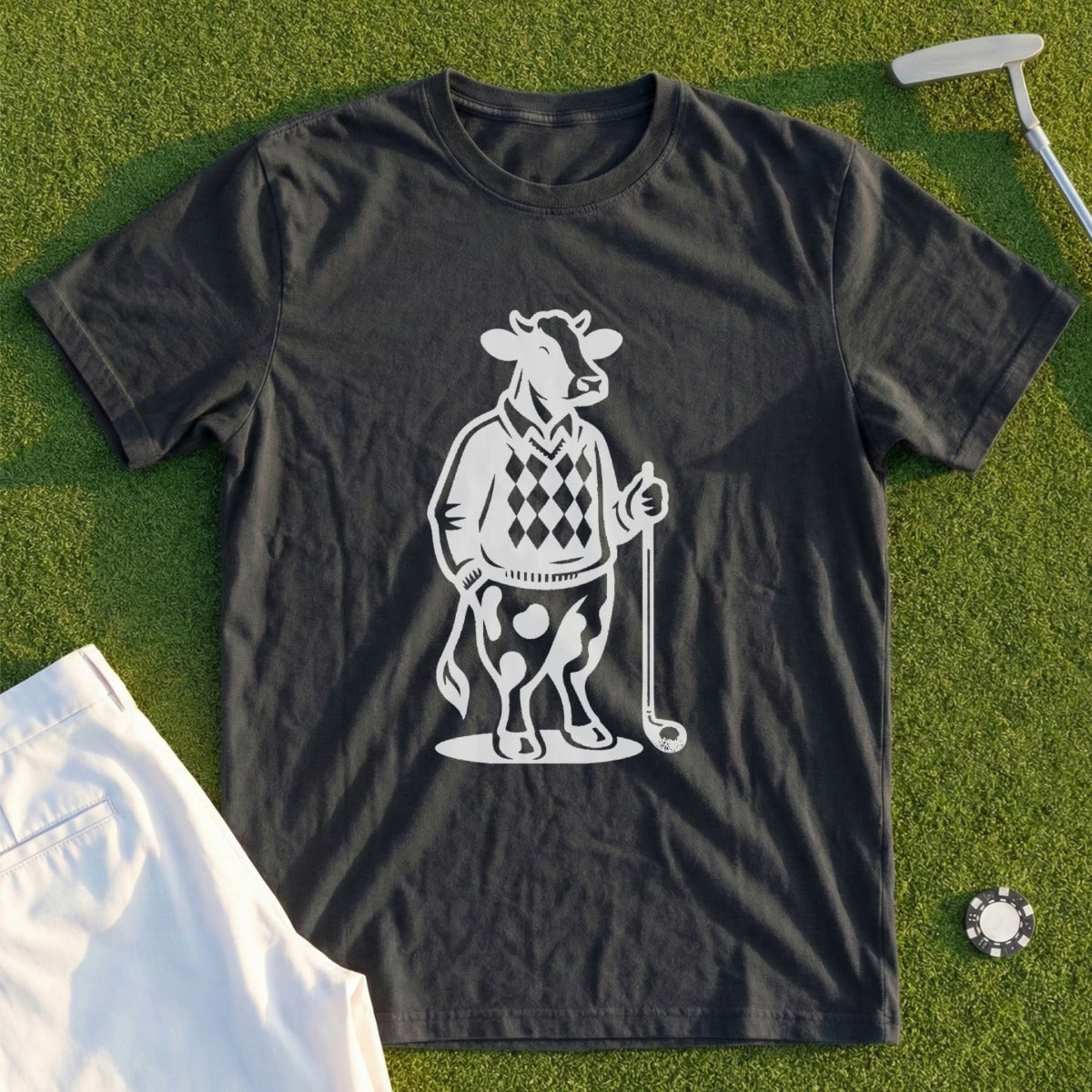 Dark grey t-shirt with white graphic of a cow in golf attire.