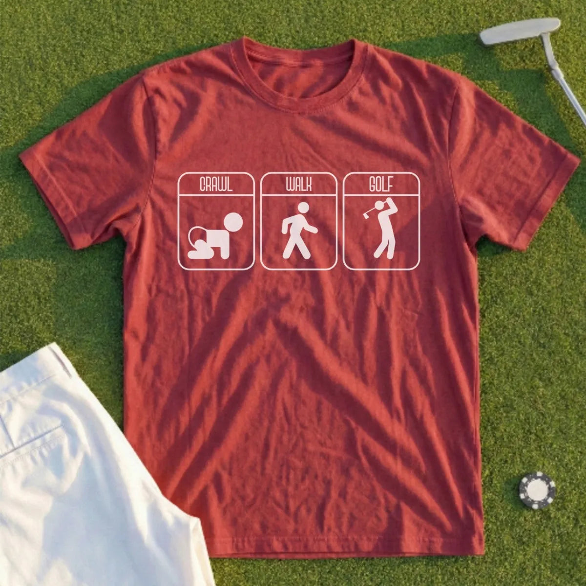 T-shirt with crawl, walk, golf progression icons and text.