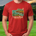 Cypress Point Travel Poster Tee worn on the golf course, Red
