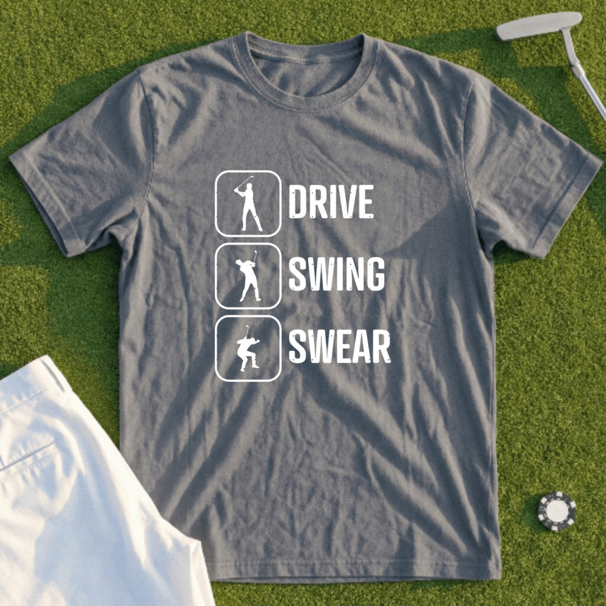 Grey t-shirt with "Drive, Swing, Swear" text and golf icons.