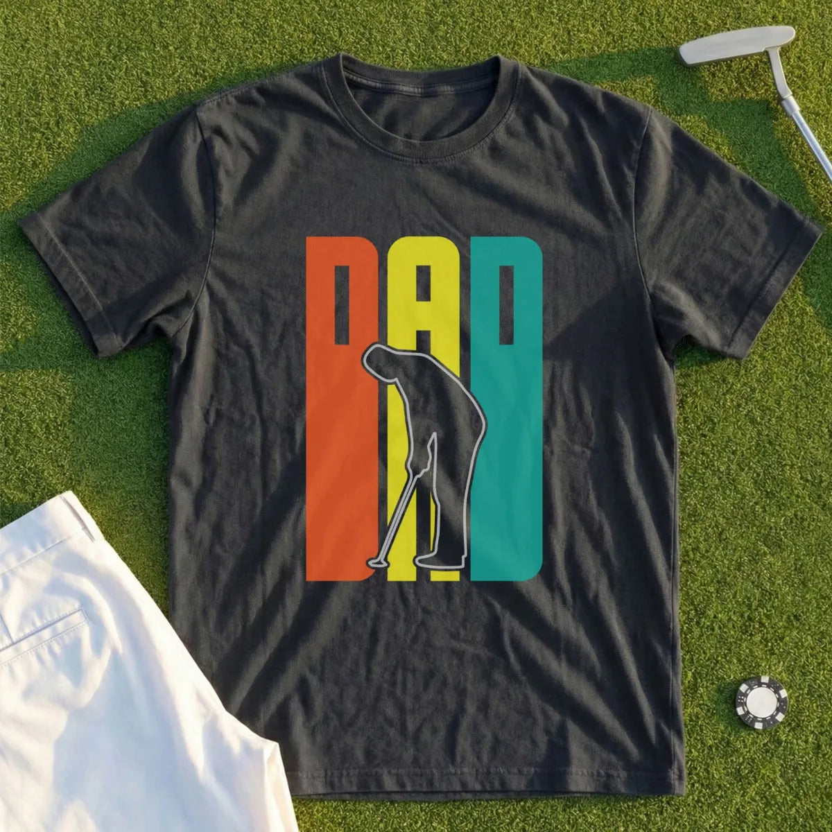 Dark t-shirt with "DAD" in colorful blocks and a golfer silhouette.