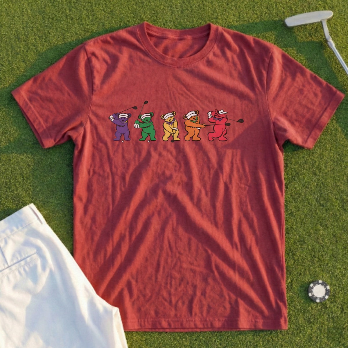 Red t-shirt with dancing bears golfing on green felt.