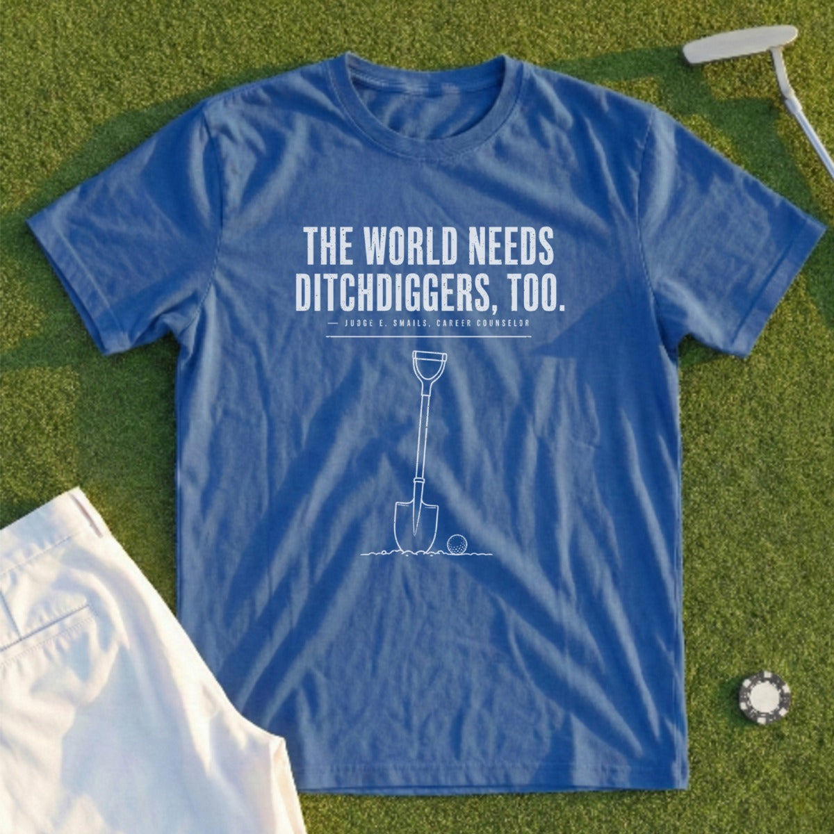 Blue t-shirt with "The World Needs Ditchdiggers, Too." and shovel graphic.