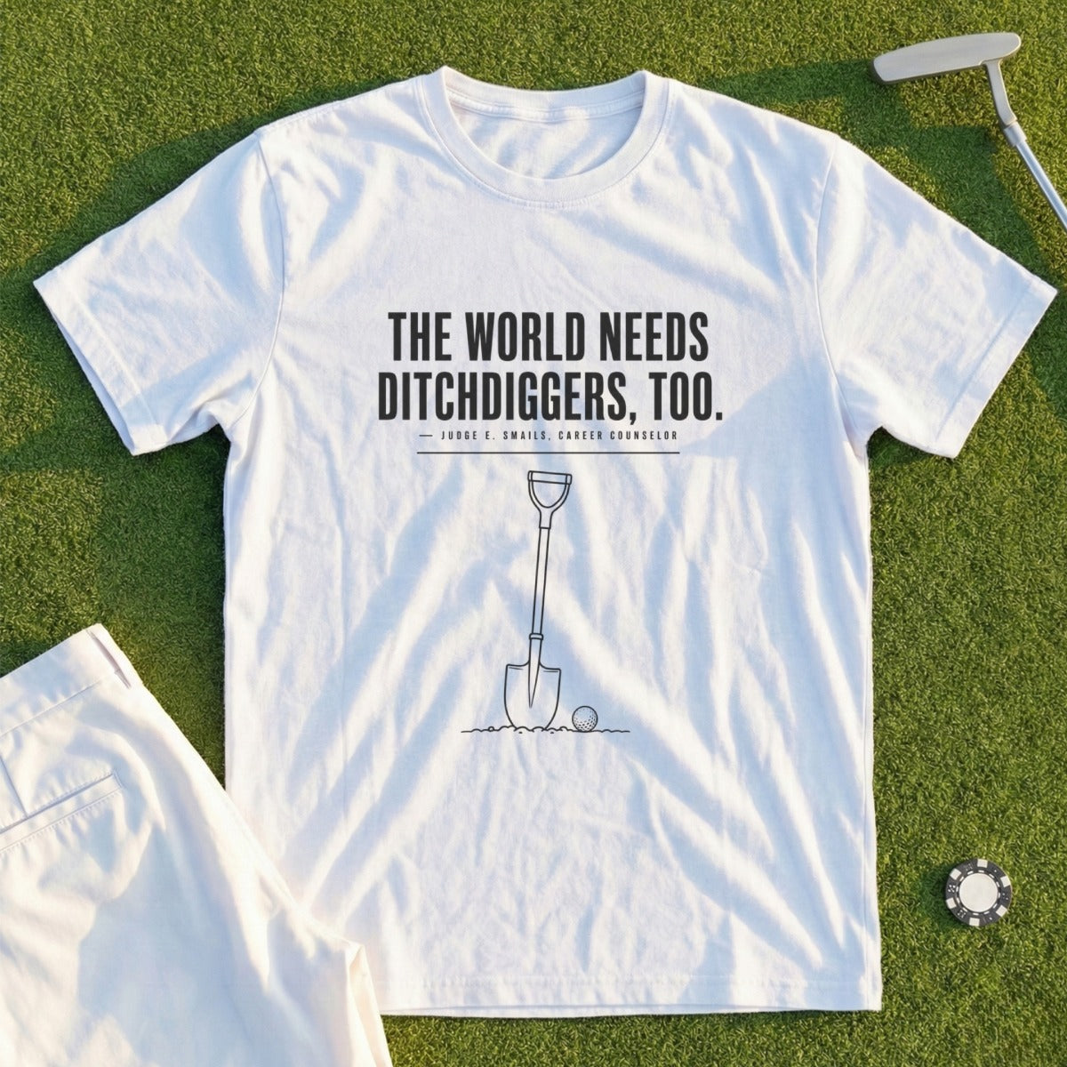 White t-shirt with "The world needs ditchdiggers, too." and shovel graphic.
