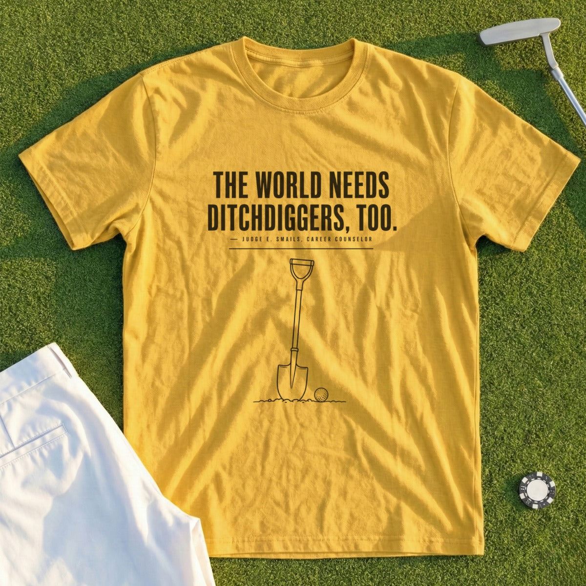 Yellow t-shirt with text "The world needs ditchdiggers, too" and a shovel graphic.