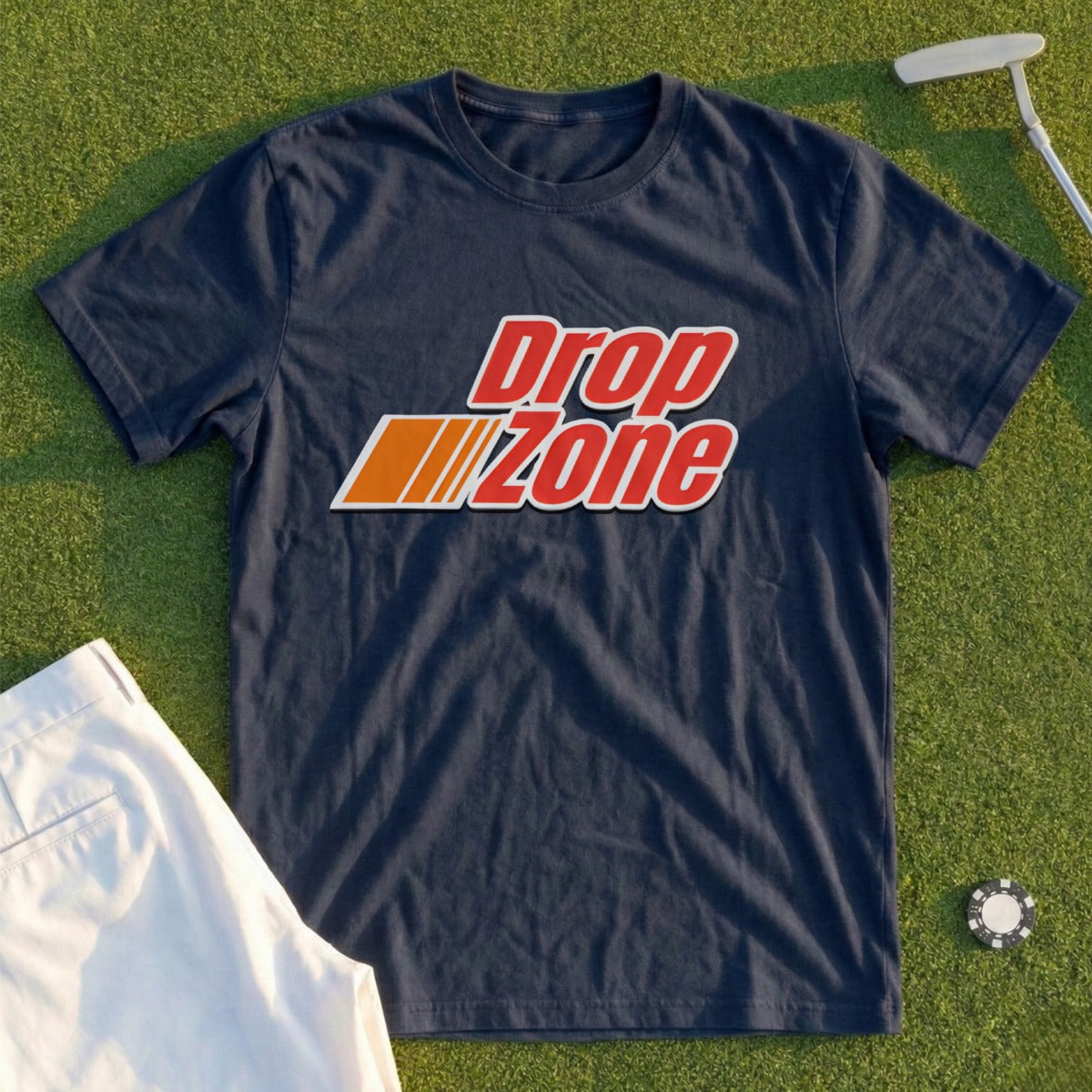 Navy t-shirt with "Drop Zone" logo, next to golf attire.